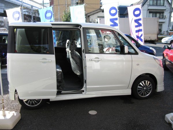 Suzuki Solio. This car has power rear sliding doors which makes it stand out from other kei's like the Wagon R.