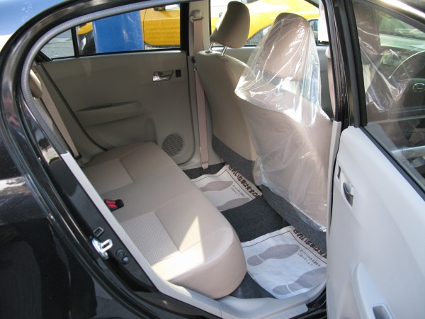 Rear seats of the Daihatsu Mira. For being such a tiny kei-car, the rear seat leg room is rather impressive. On par with many midsize sedans.