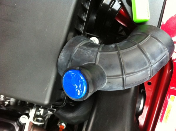 The small intake &quot;tube&quot; closes to the bumper, take out that big silencer and i capped it with a lactaid milk bottle cap. a regular pepsi cap doesnt fit.