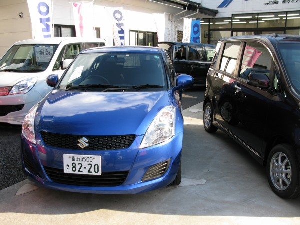 Suzuki Swift and Solio on the left.