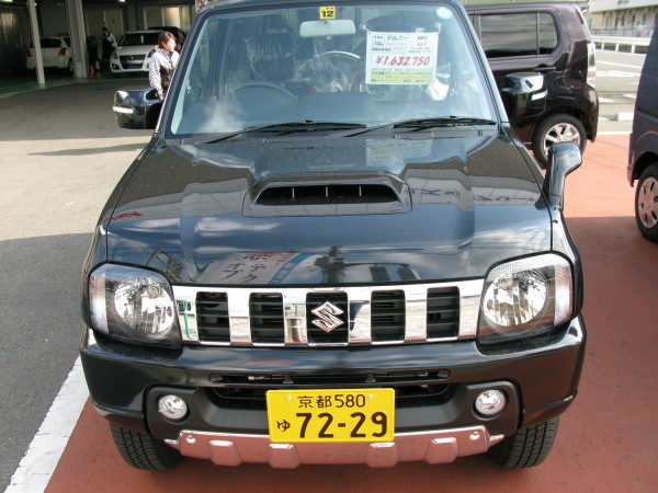 Suzuki Jimny. This model is the kei-truck version with a 660cc engine. A non-kei 1.3L engine is also offered. The hood scoop is for an intercooler for the turbo. Although the power output is roughly 67hp, the vehicle's light weight allows for some spirited driving according to many. The car is said to be the Mazda Miata of the offroad world. I personally really like the Jimny given my offroad experiences in Suzuki SUVs.