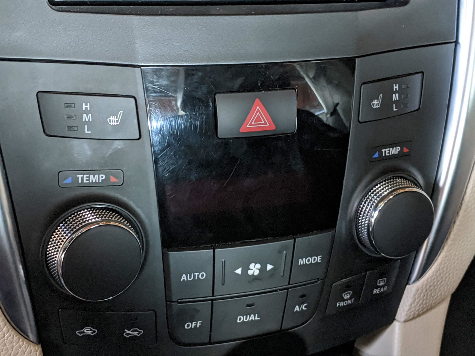 Climate panel with heated seat buttons